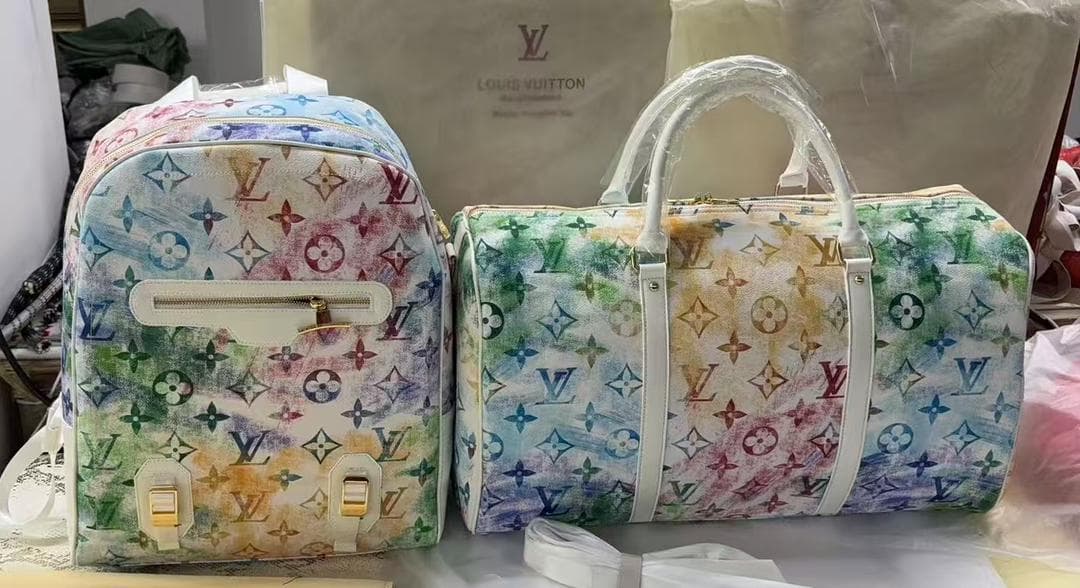 Rainbow watercolor LV monogram backpack and duffle bag set.