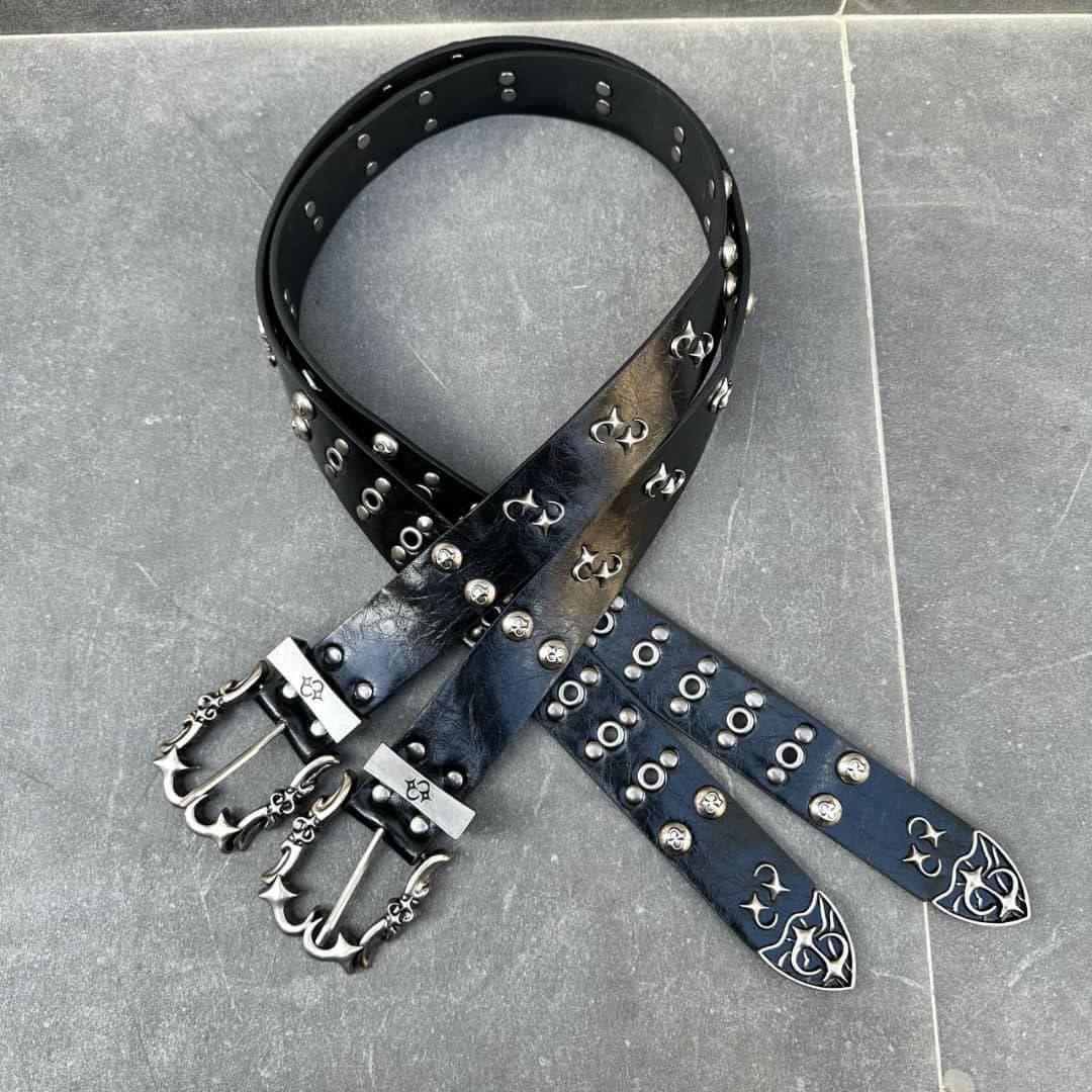 Black leather gothic belt with ornate buckles and metal details.