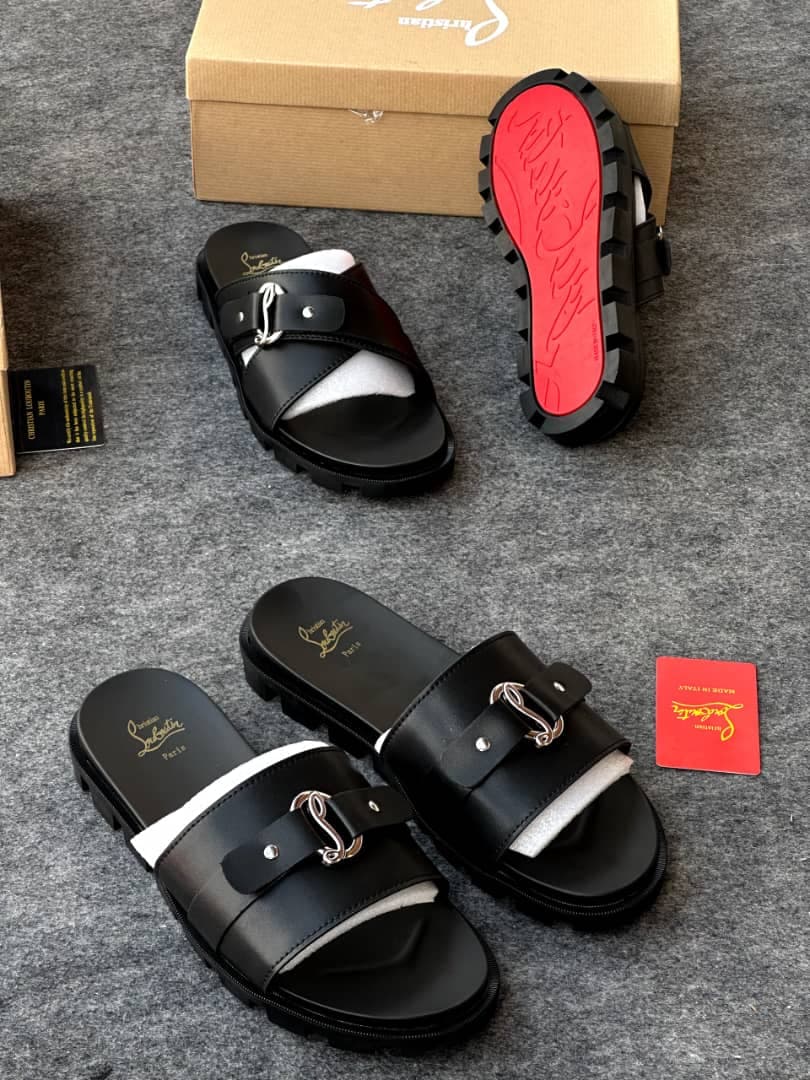 Multiple views of black Louboutin slides showing insole logo, buckle detail and red bottom.