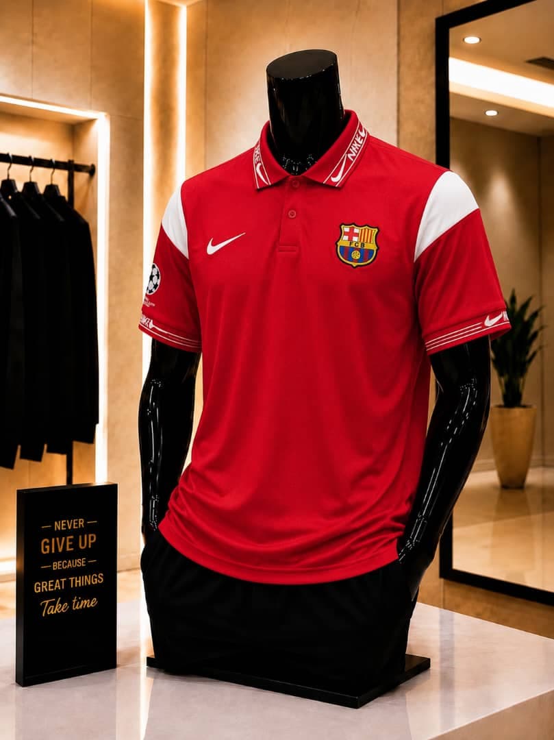 Red FC Barcelona Nike polo jersey on mannequin.