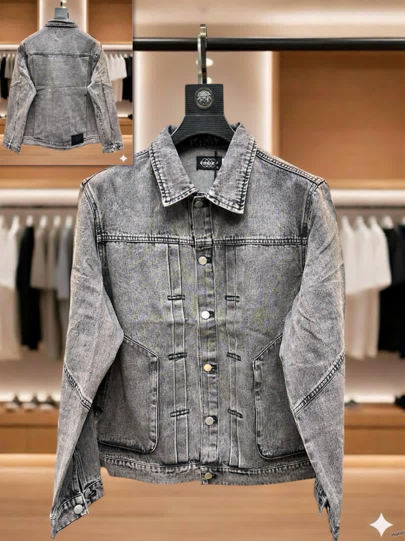 Light gray acid wash denim jacket with button closure, collar and multiple pockets displayed on hanger with back view inset.
