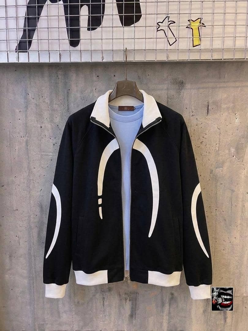 Black zip jacket with white curved lines and layered t-shirt.