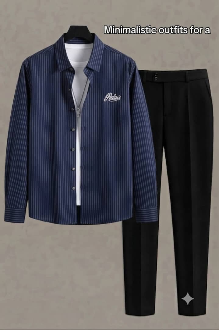 Palais navy striped shirt worn open over white tee with necklace and black trousers.