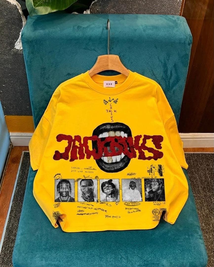 Yellow long sleeve tee with Jackboys mouth graphic and artist photos.