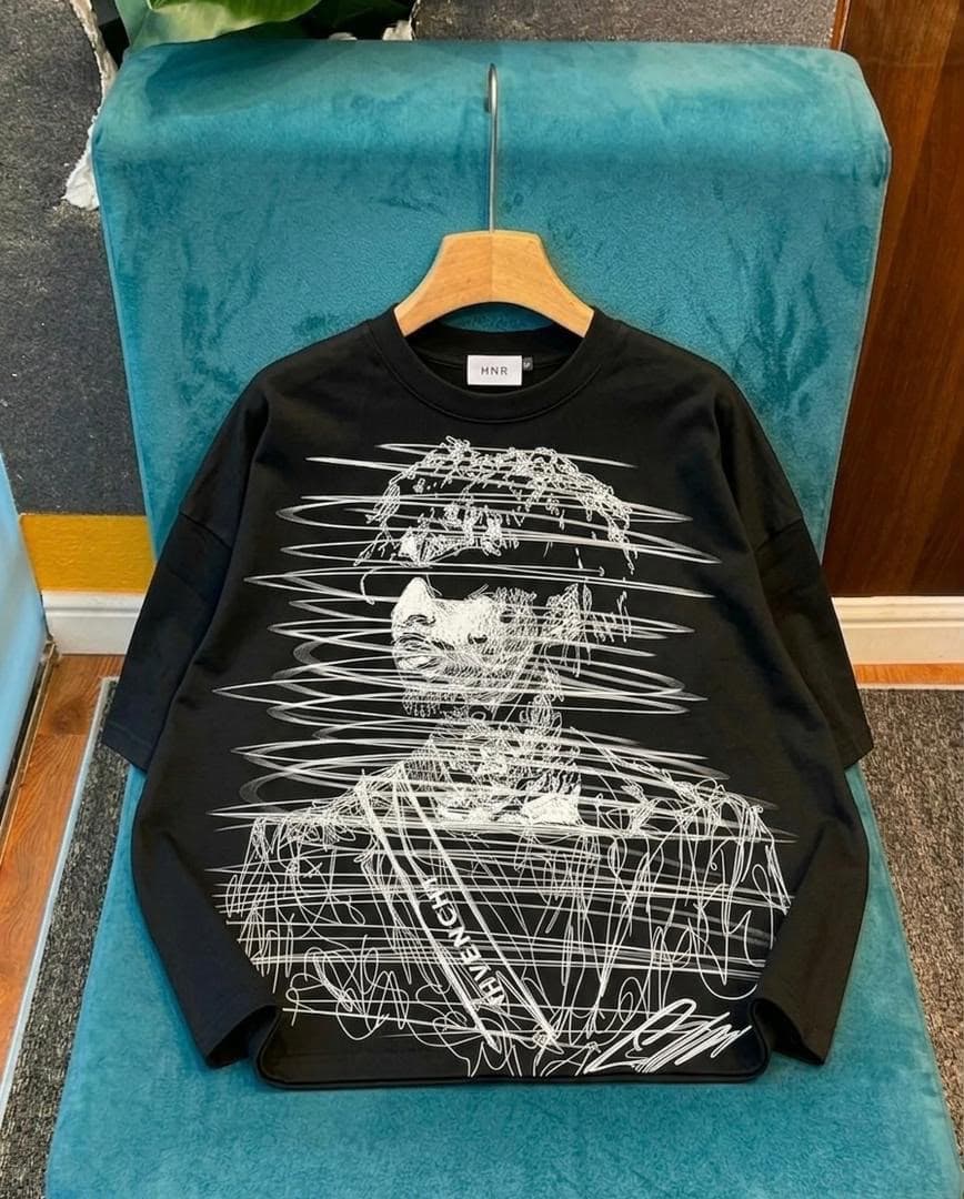 Black long sleeve tee with white abstract line sketch portrait graphic.