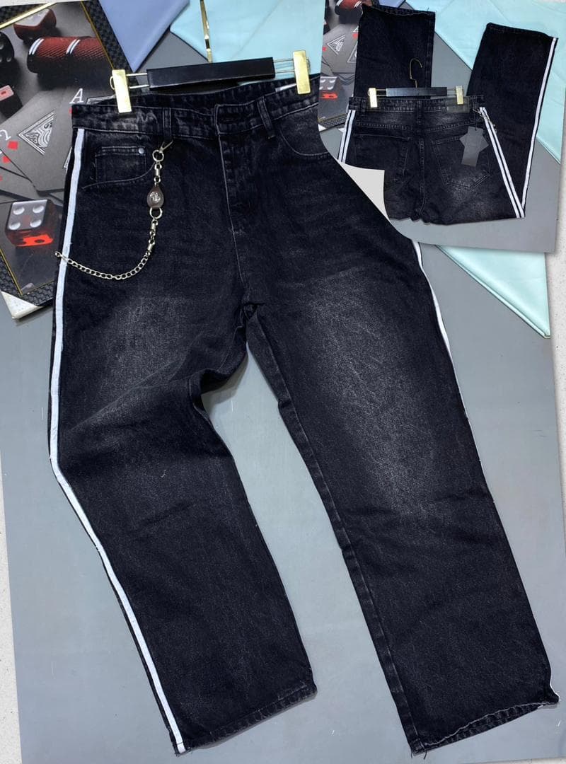 Black baggy jeans with white side stripes and chain accessory, front view with back inset.