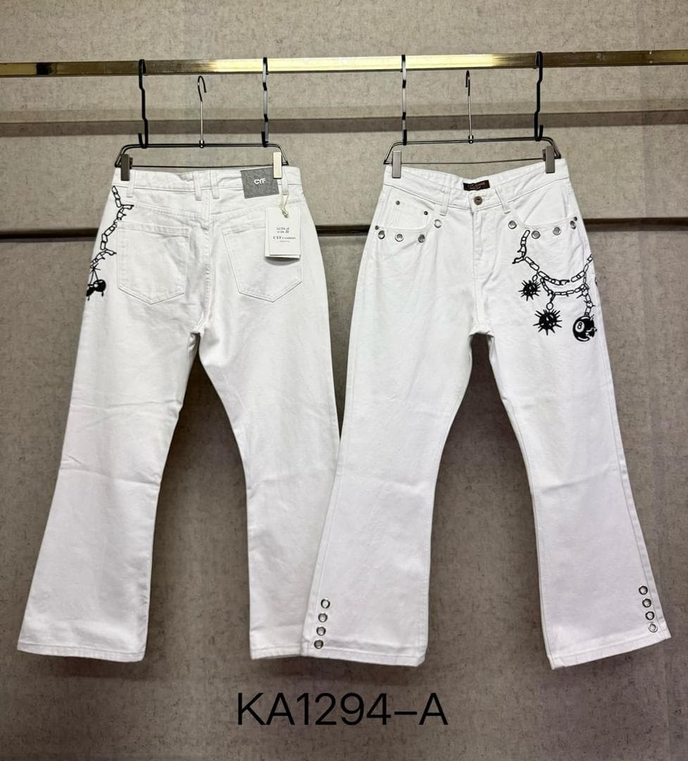 Two pairs of white baggy flared jeans on hangers displaying chain skull and side seam designs.
