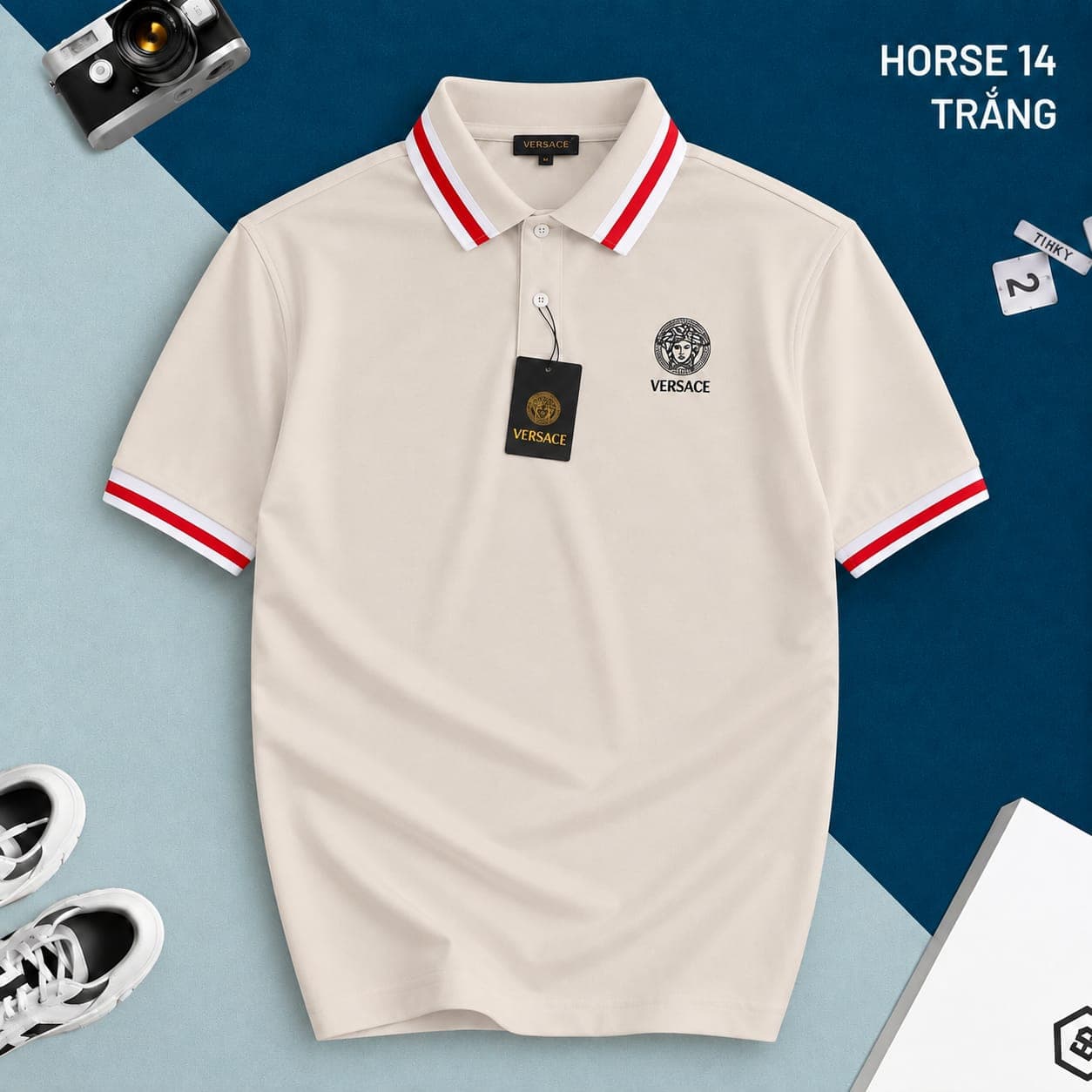 Beige Versace polo shirt with red and white trim and Medusa logo on chest.