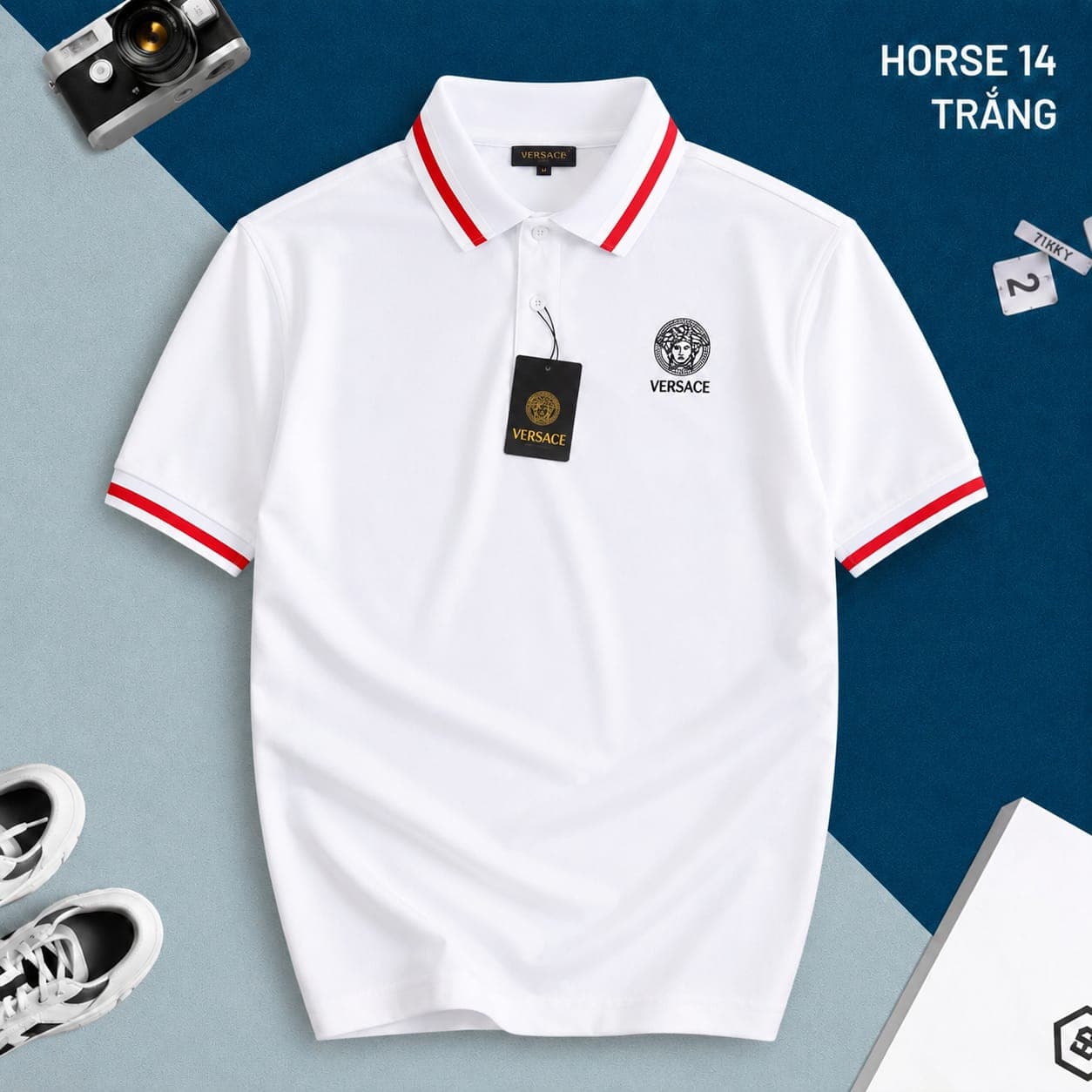 White Versace polo shirt with red and white trim and Medusa logo on chest.