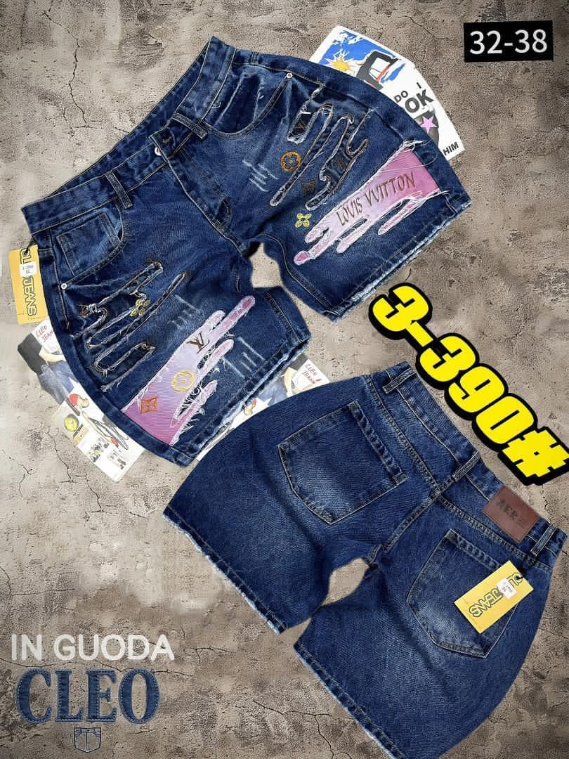 Dark blue denim shorts with multiple LV patches, text prints and distressing shown in two views.