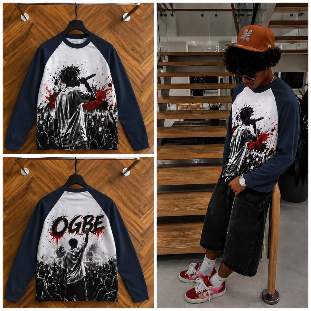 Navy raglan long sleeve t-shirt with performer graphic on front and OGBE print on back, shown on hanger and model.