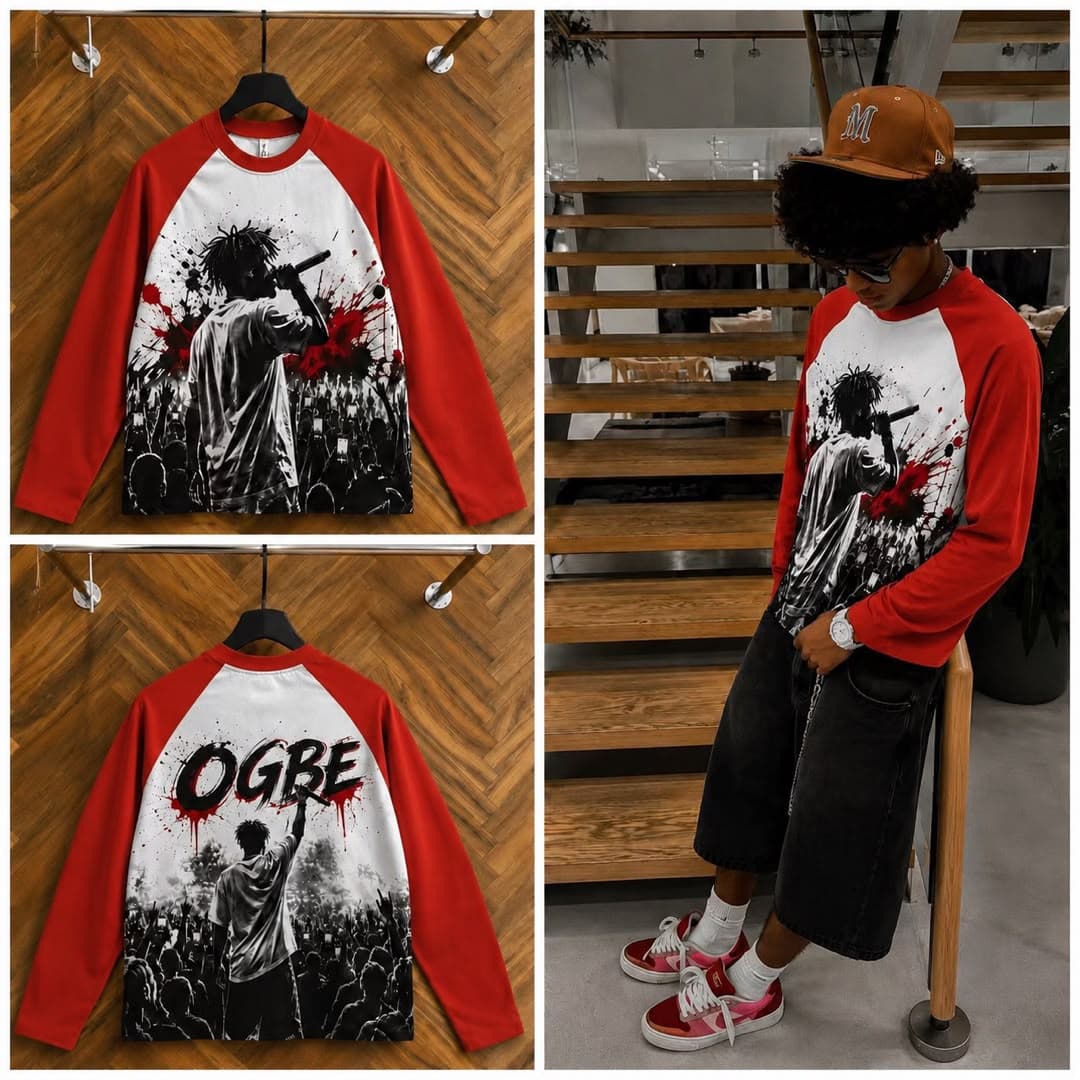 Red raglan long sleeve t-shirt with performer graphic on front and OGBE print on back, shown on hanger and model.