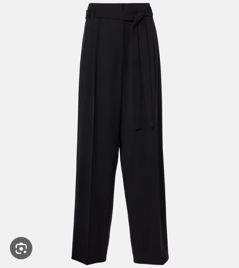 Black pleated wide-leg flare pants with tie belt, full front view on white.