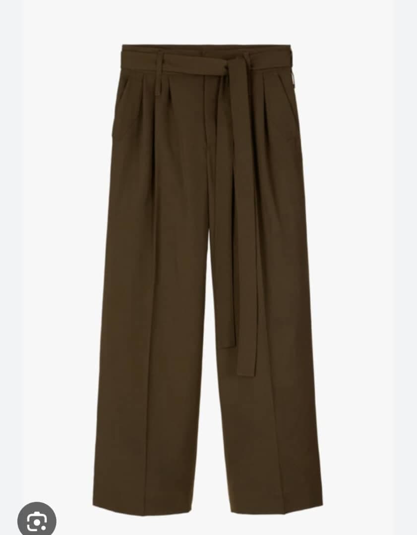 Brown pleated wide-leg flare pants with self-tie belt against white background.
