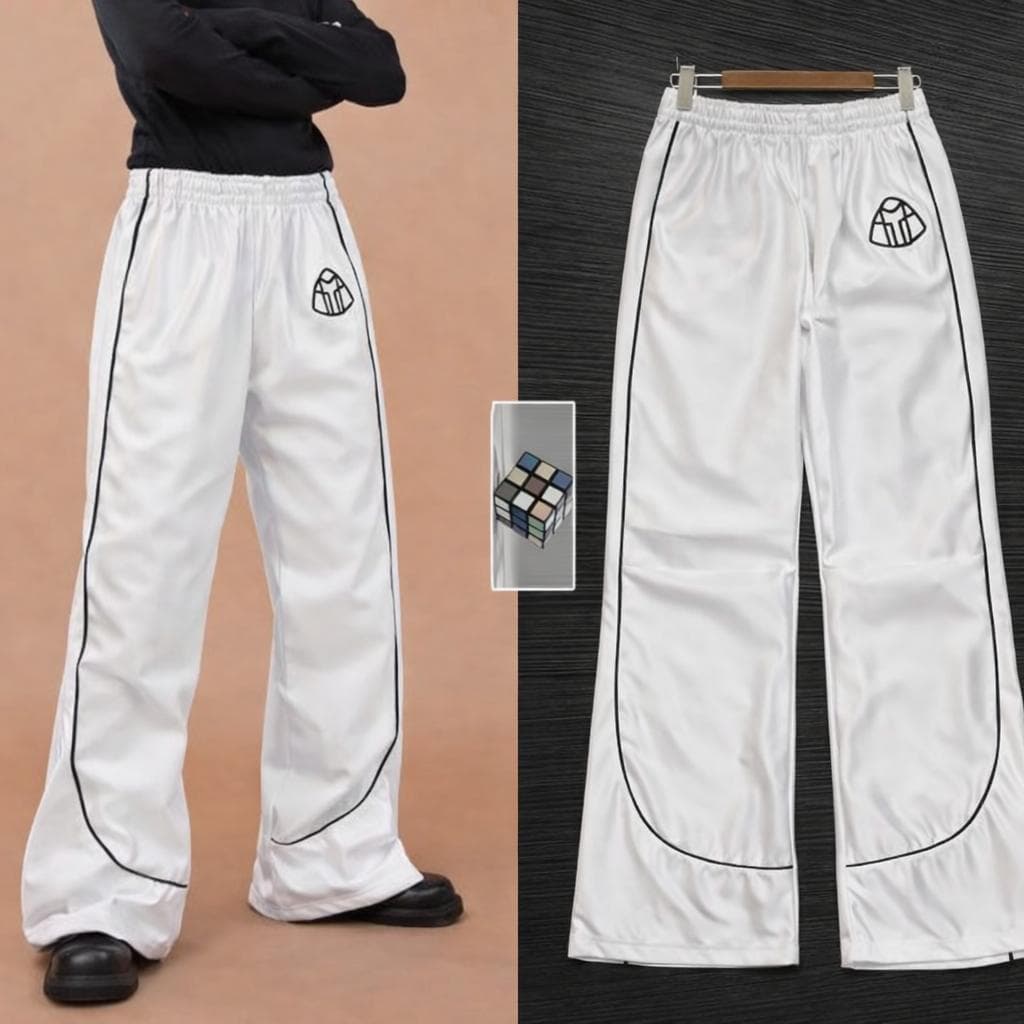 Model wearing white track pants with black piping beside flat lay view and small logo detail.