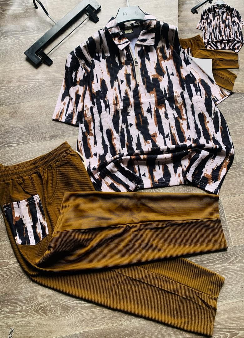 Brown abstract print ribbed quarter-zip polo two-piece set.