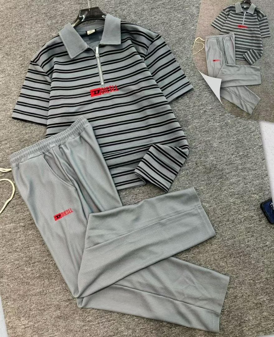 Gray and black striped ribbed quarter-zip polo two-piece set.