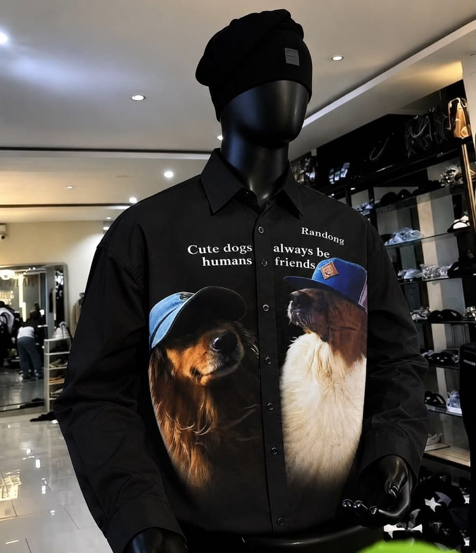 Black long sleeve shirt with cute dogs graphic on mannequin.