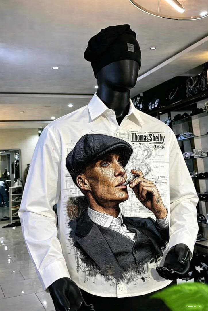 White long sleeve shirt with Thomas Shelby graphic on mannequin.