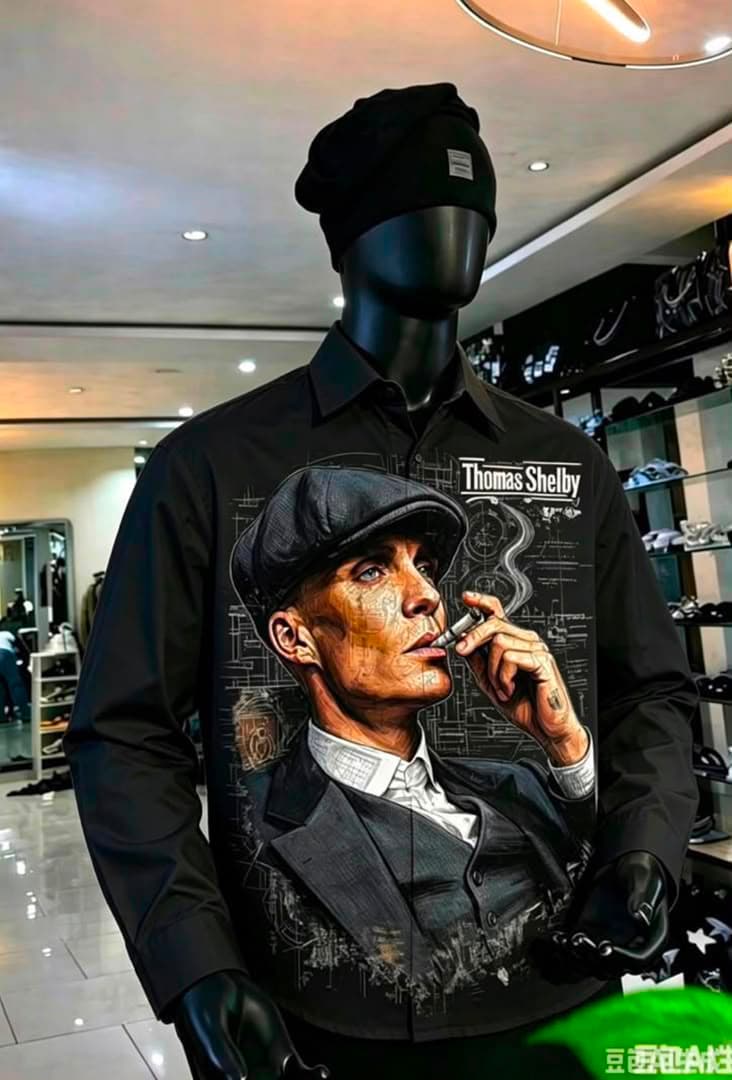 Black long sleeve shirt with Thomas Shelby graphic on mannequin.