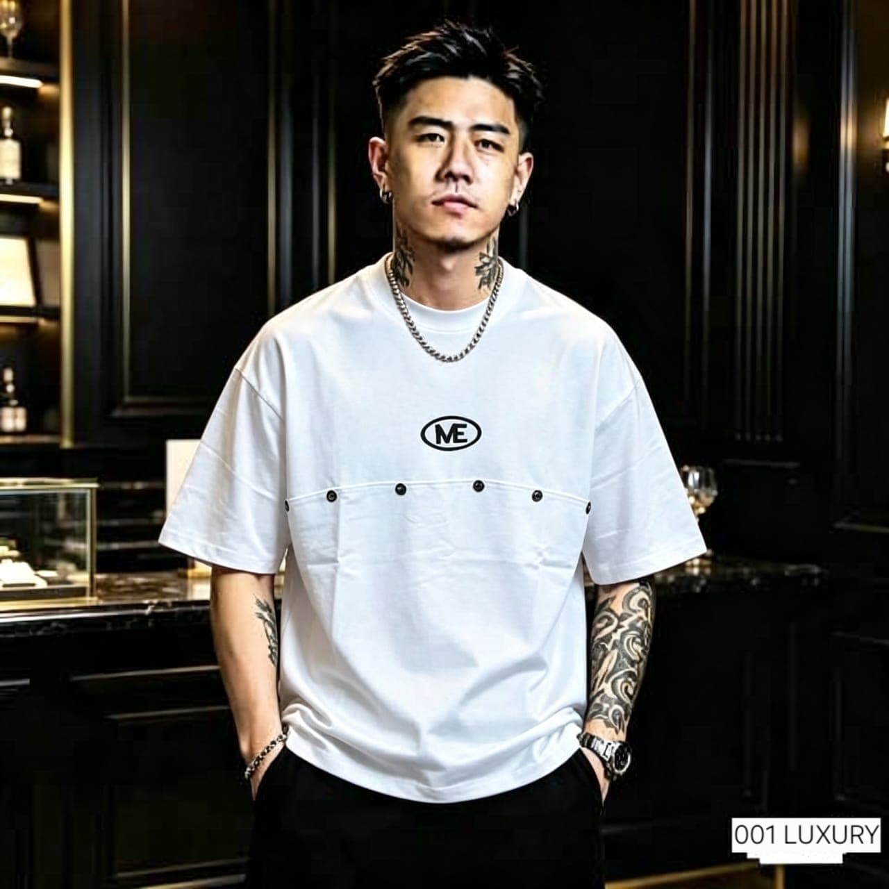Model wearing white oversized t-shirt with ME logo and front pocket.