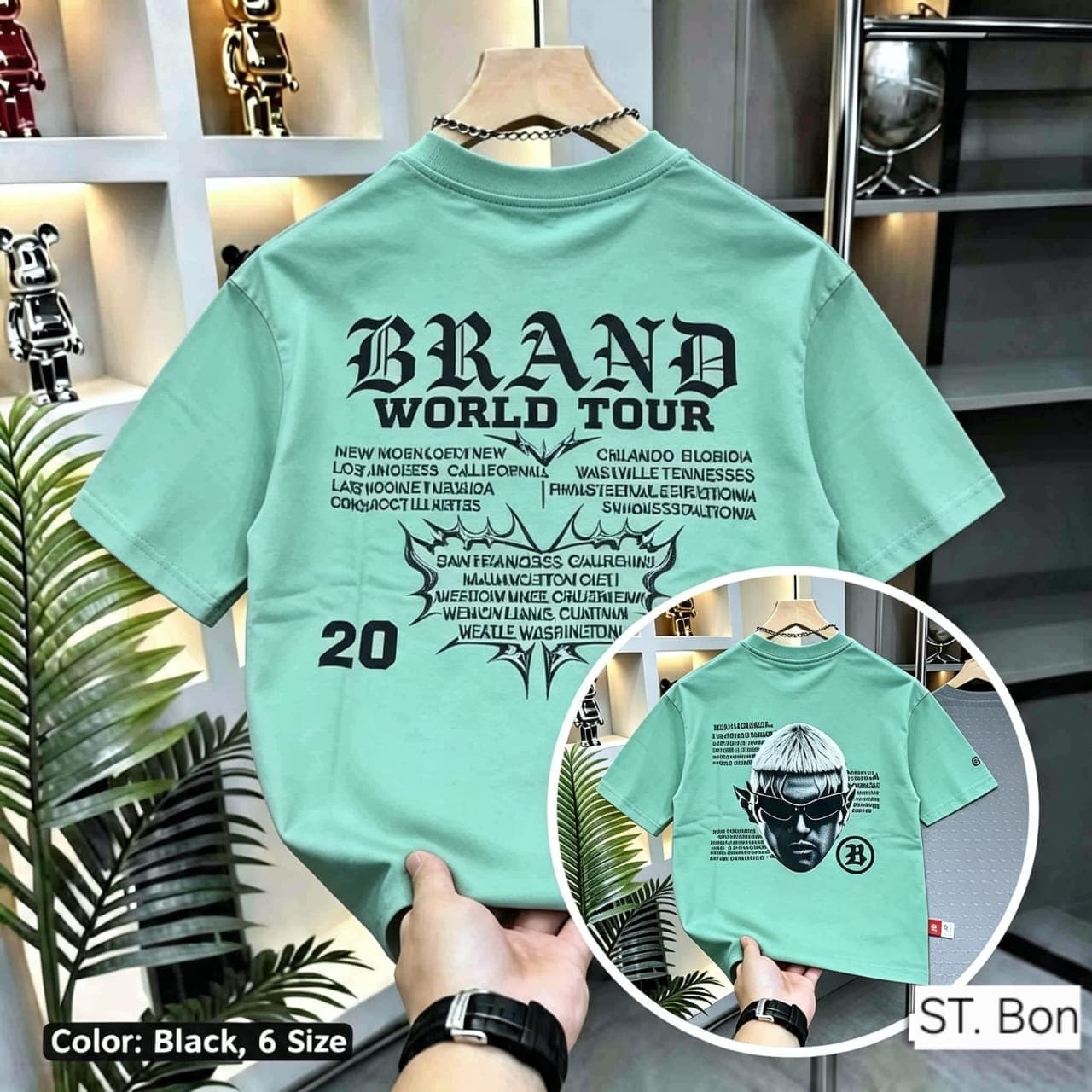 Green t-shirt with Brand World Tour back print, city names and front portrait inset.