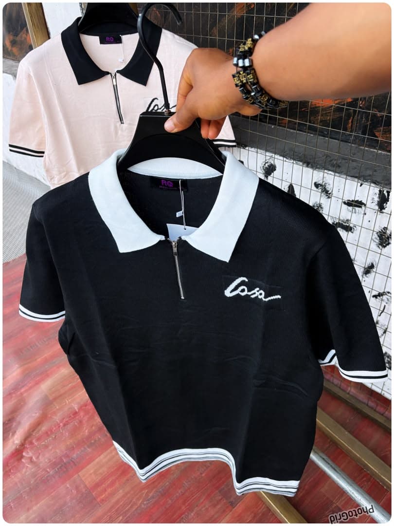 Black contrast collar quarter-zip polo shirt with Casa embroidery.