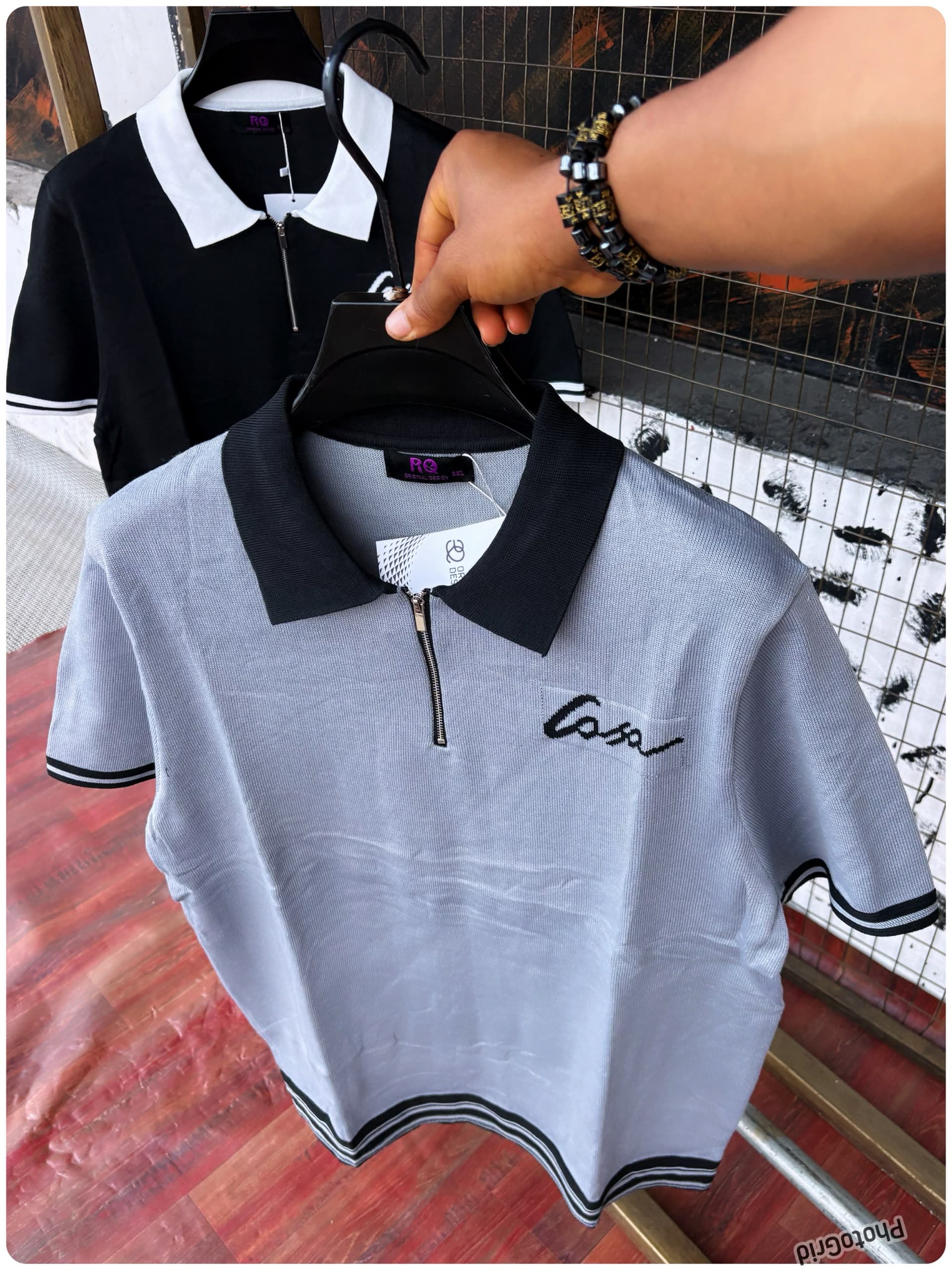 Gray contrast collar quarter-zip polo shirt with Casa embroidery.