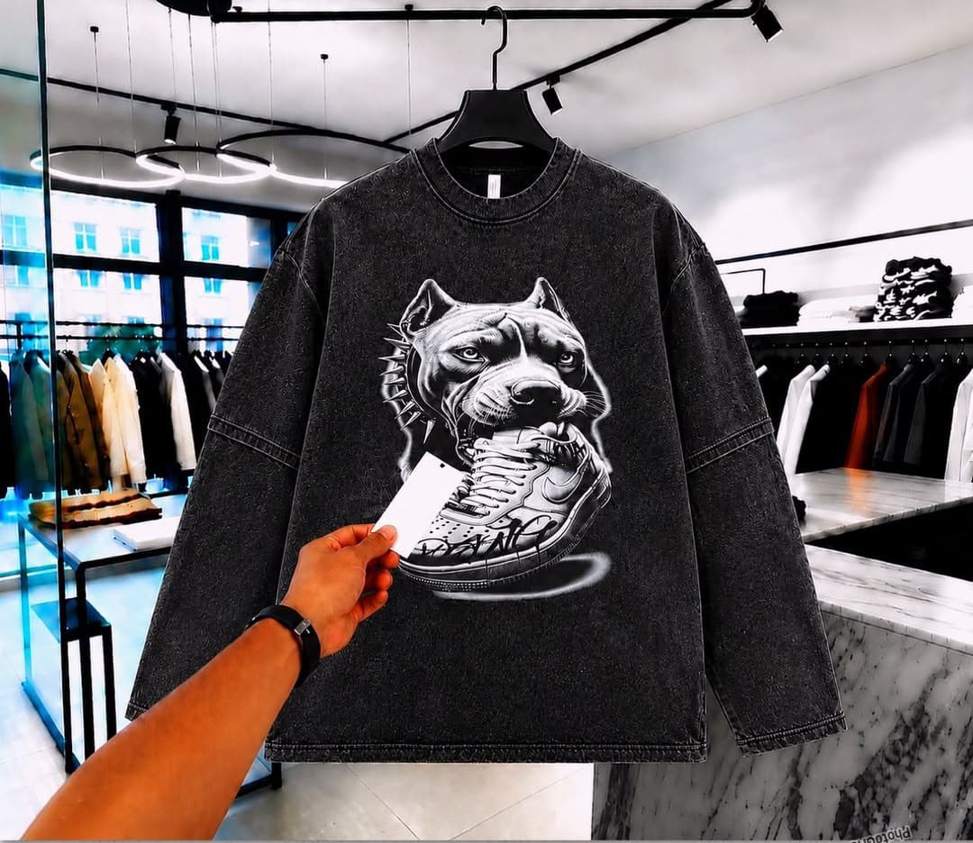 Stonewashed black long sleeve t-shirt with pitbull and sneaker graphic on front.