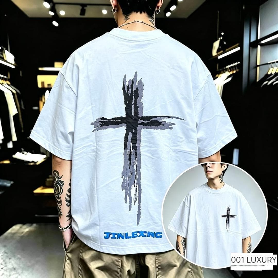 Man in white oversized t-shirt with large black cross graphic on back and JINLEXING text.