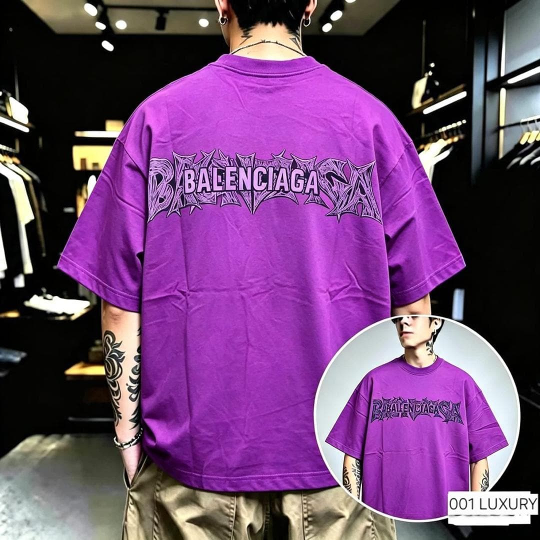 Man in purple Balenciaga graphic oversized t-shirt, back view with matching stylized logo.