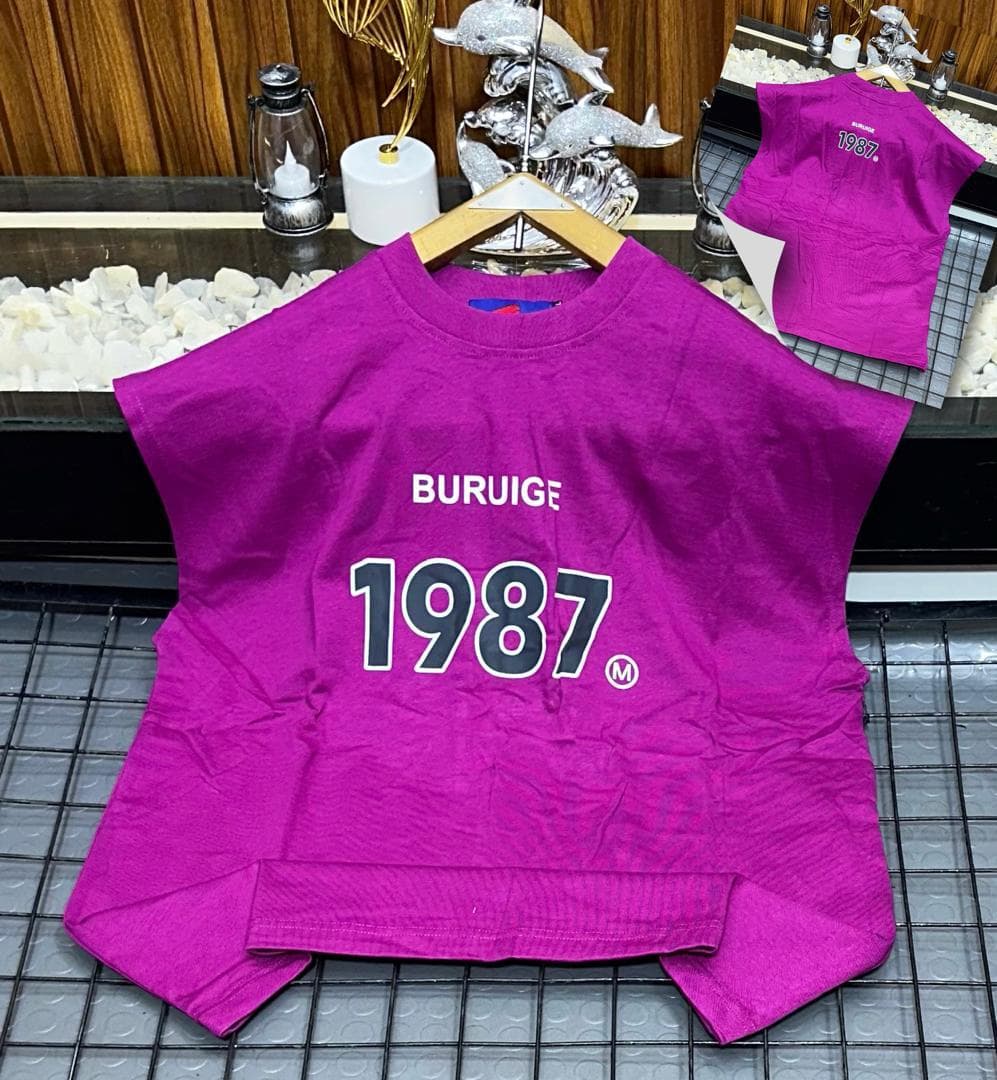 Purple Buruige 1987 sleeveless sweatshirt on hanger with back inset view.