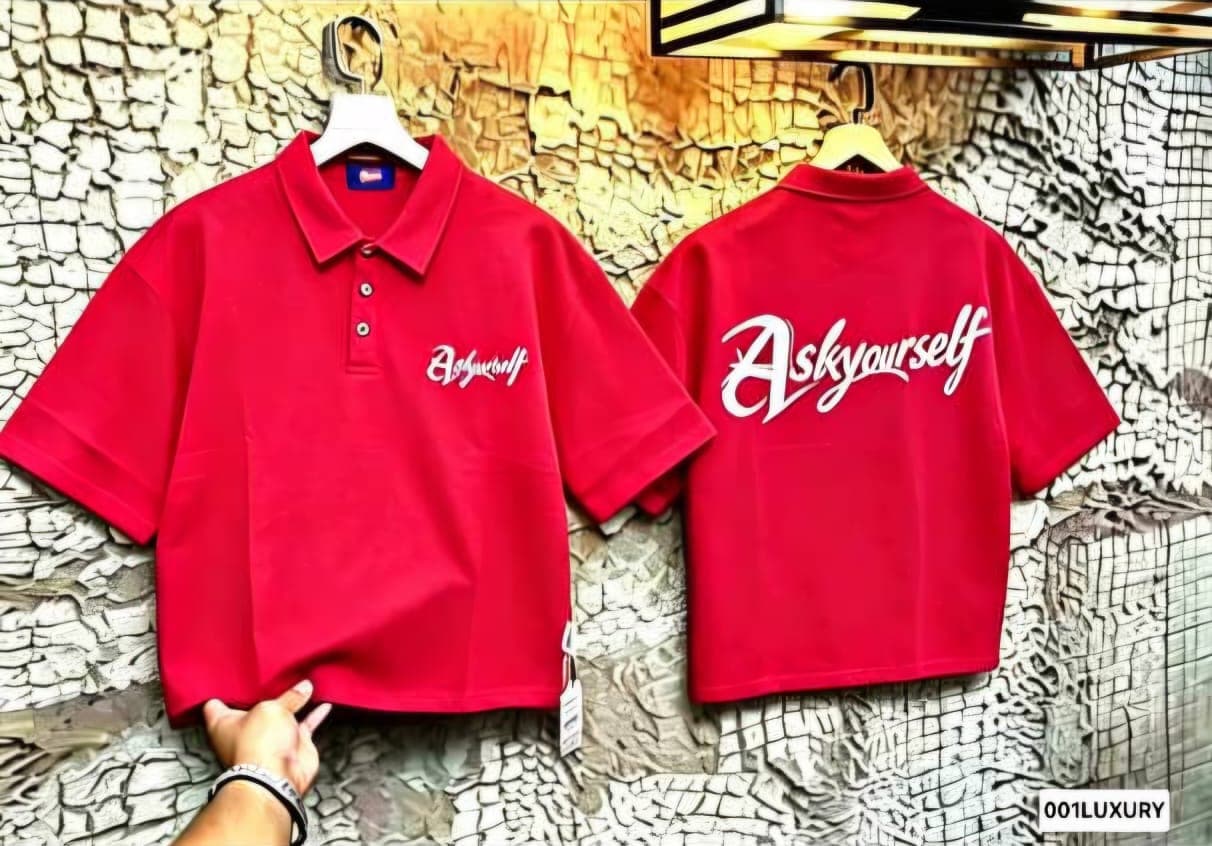 Red polo shirt with Askyourself text print, front and back views.