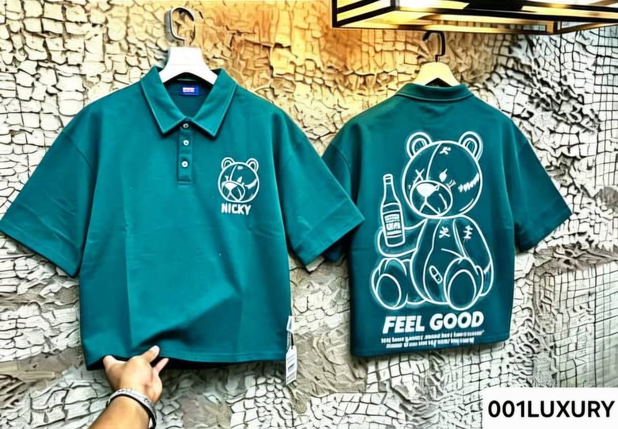 Front and back of teal polo shirt with teddy bear graphics, NICKY text and FEEL GOOD slogan.