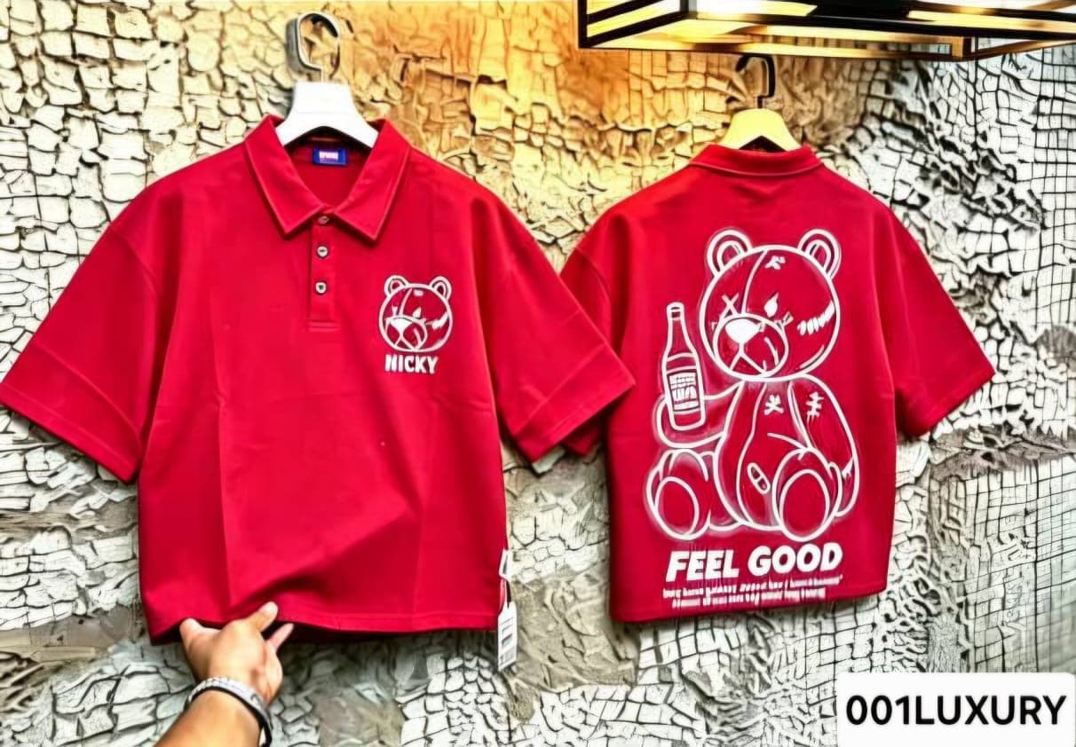 Front and back of red polo shirt with teddy bear graphics, NICKY text and FEEL GOOD slogan.