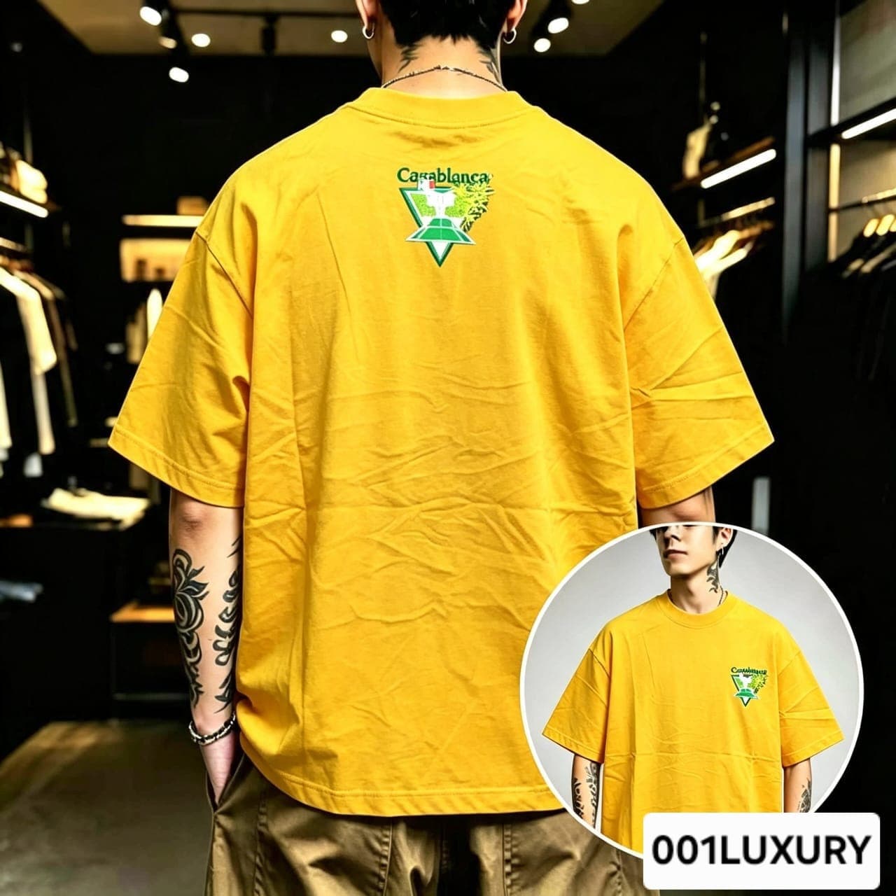 Man viewed from back wearing yellow oversized t-shirt with large Casablanca triangular graphic print.