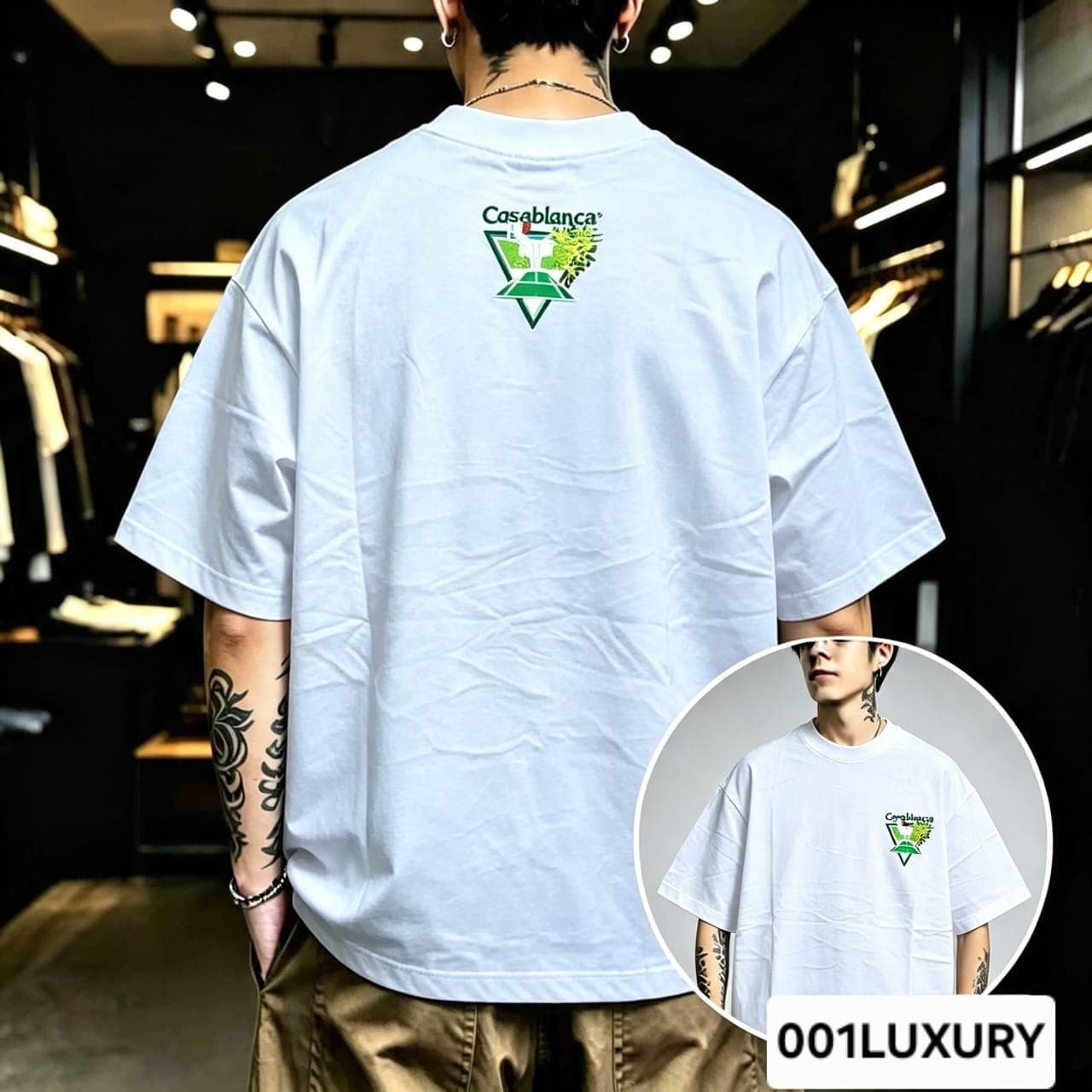 Man viewed from back wearing white oversized t-shirt with large Casablanca triangular graphic print.