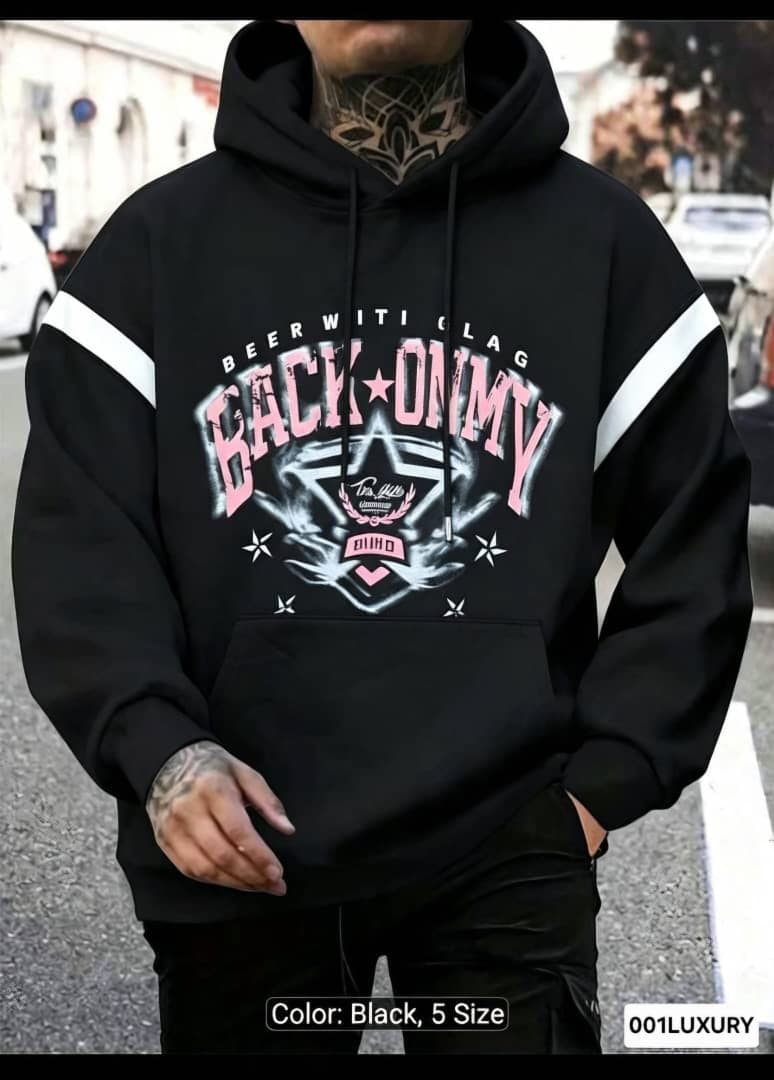 Man in black Back Onmy graphic hoodie with detailed front print.
