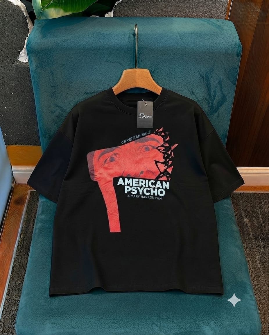 Black oversized short sleeve crop tee with red American Psycho Christian Bale face graphic.