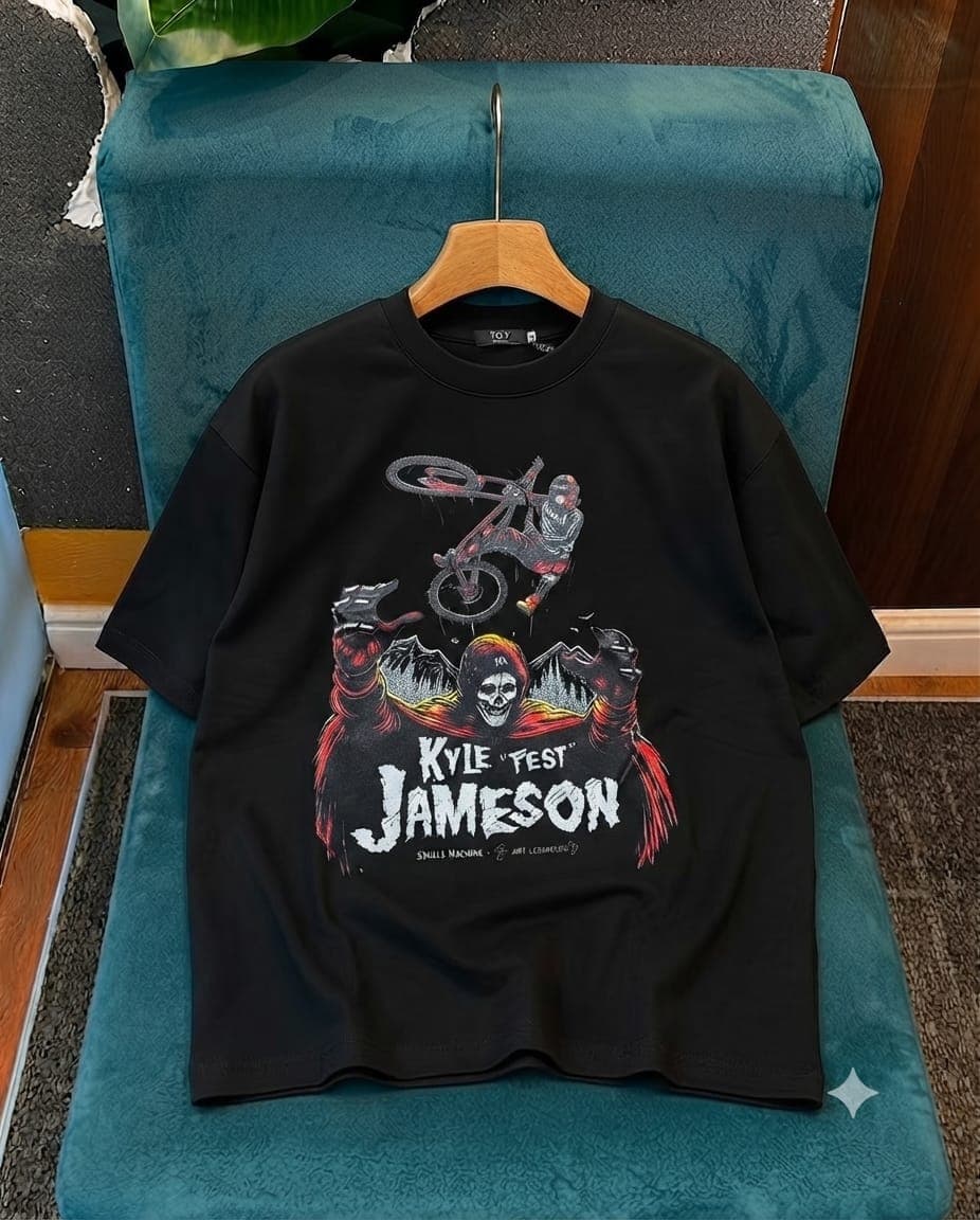 Black oversized crop tee with skeleton BMX rider, mountains and Kyle Fest Jameson text.