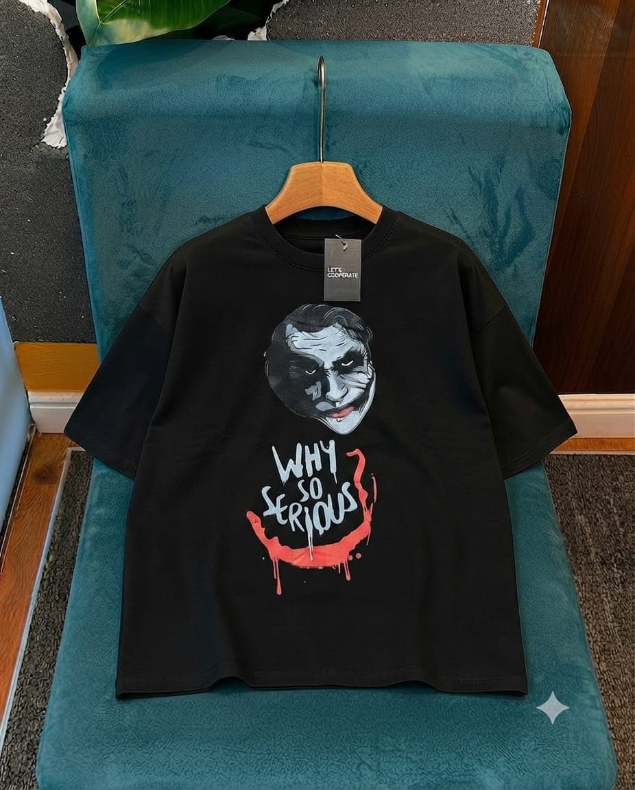 Black oversized crop tee featuring Joker face graphic and Why So Serious text.