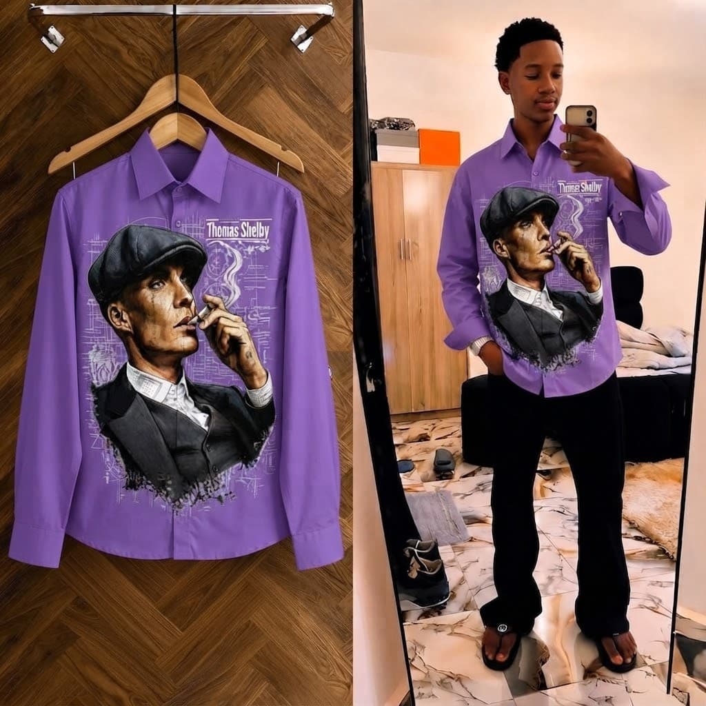 Purple long sleeve shirt with Thomas Shelby graphic on hanger and worn by model in mirror selfie.