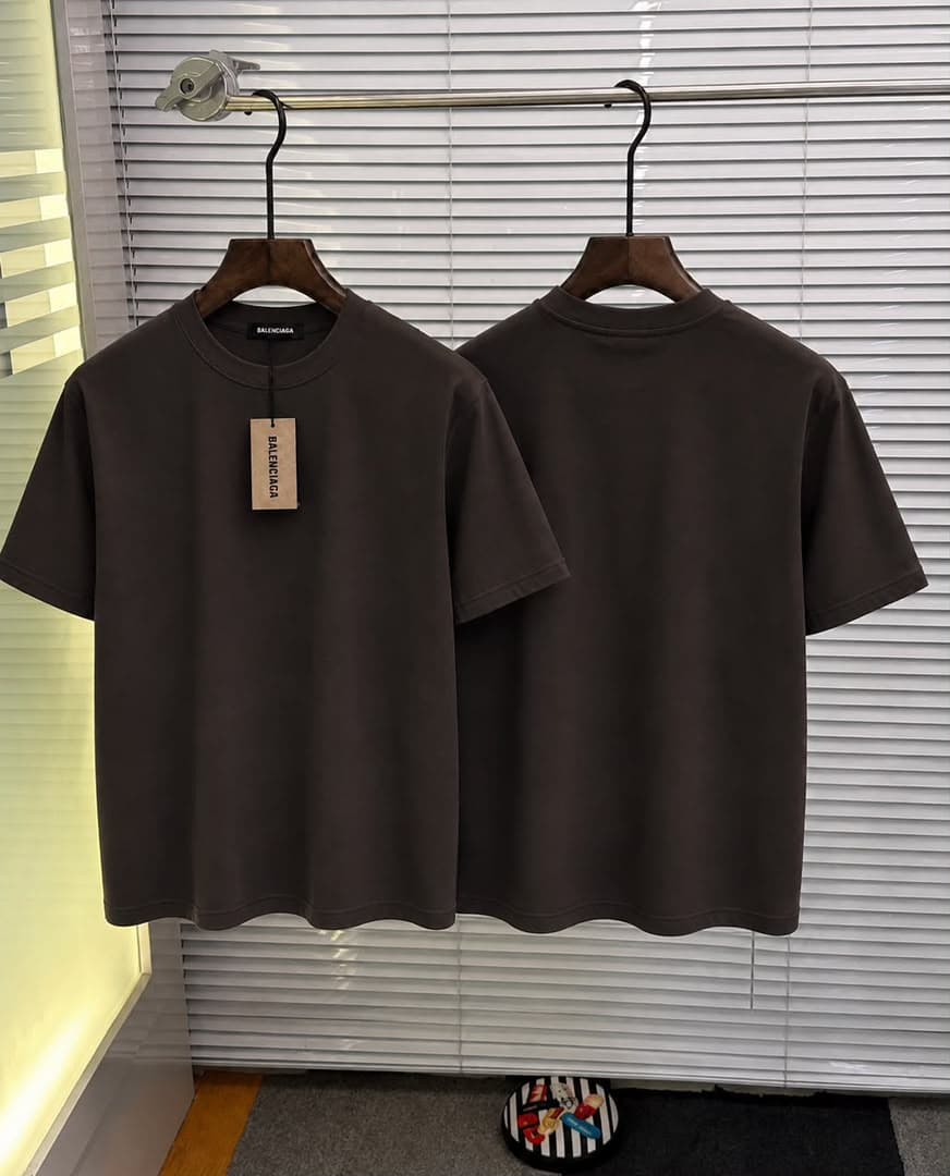 Brown plain T-shirt shown front and back with Balenciaga tags.