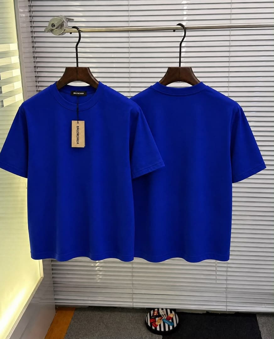 Royal blue plain T-shirt shown front and back with Balenciaga tag.