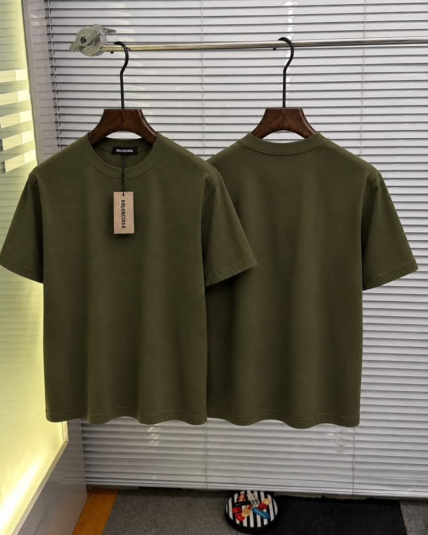 Olive plain T-shirt shown front and back with Balenciaga tags.