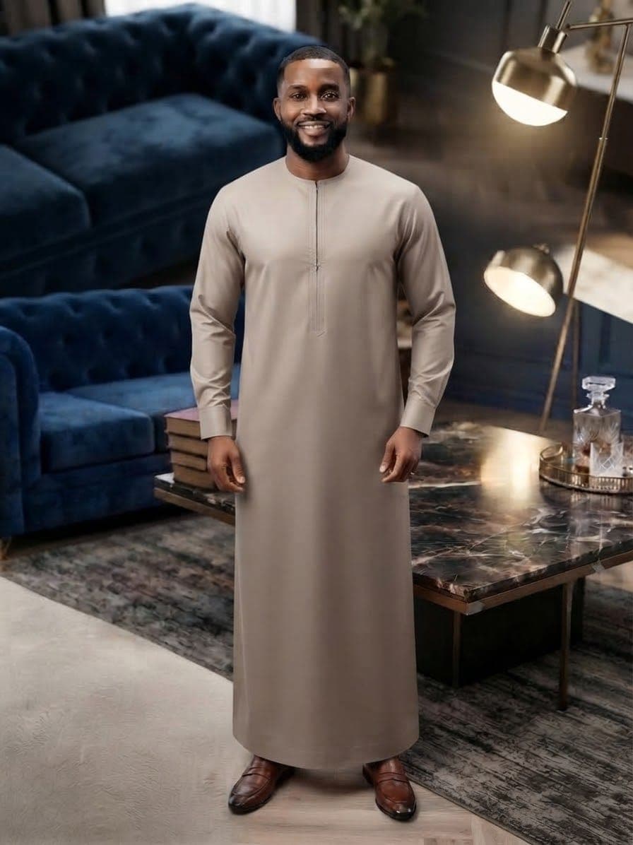 Model wearing tan plain kaftan.