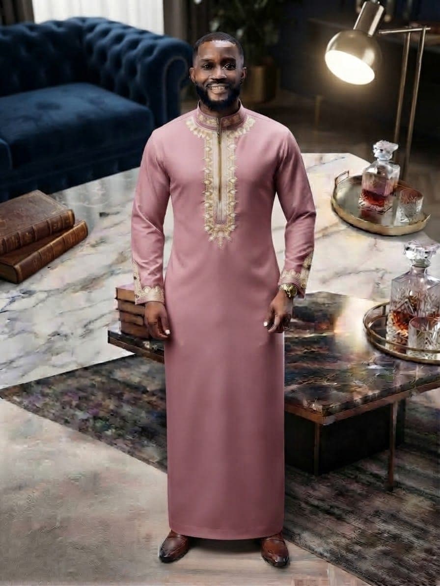 Model wearing pink embroidered kaftan.