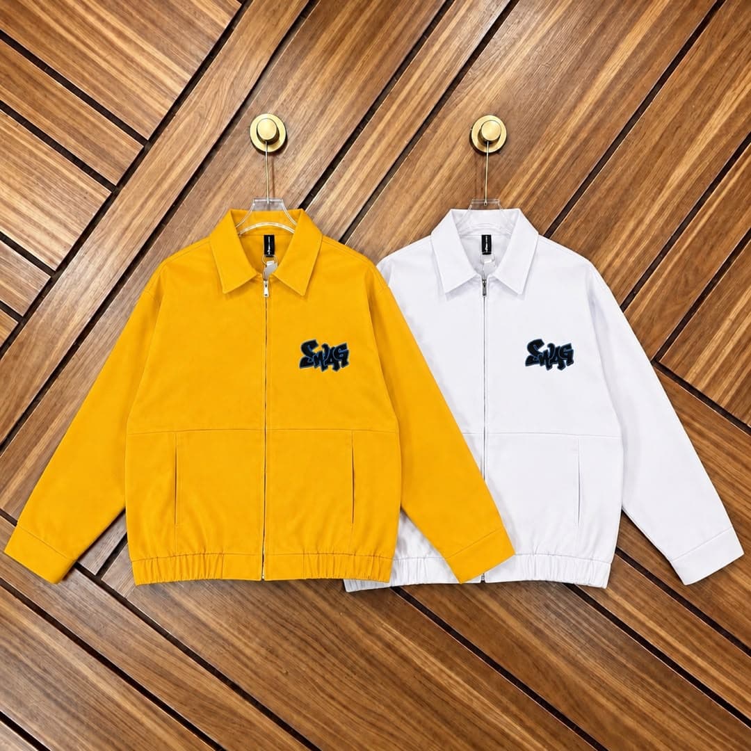 Yellow and white unisex zip-up jackets with SWAG logo on chest, shown side by side.