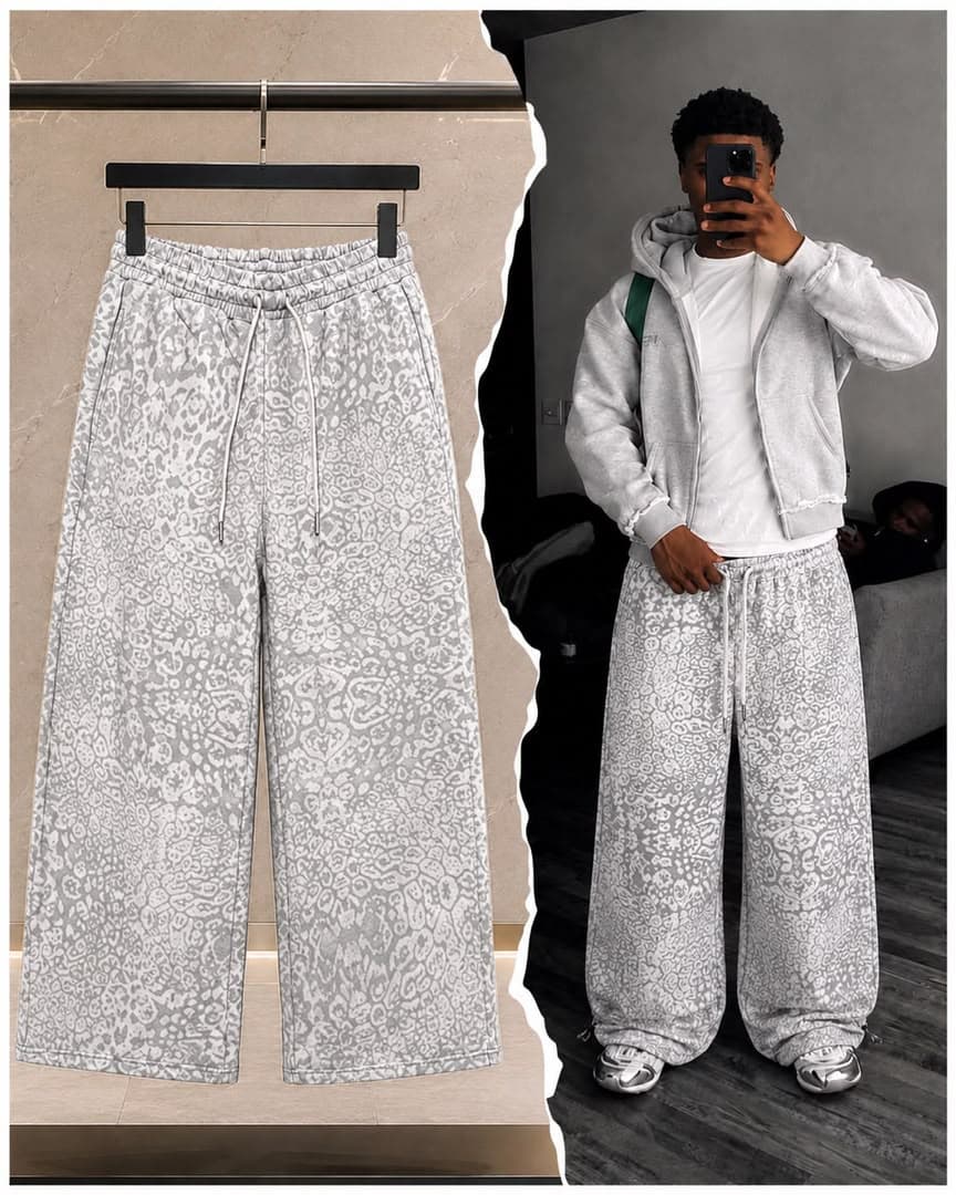 Light gray all-over print joggers shown flat on hanger and worn by model.