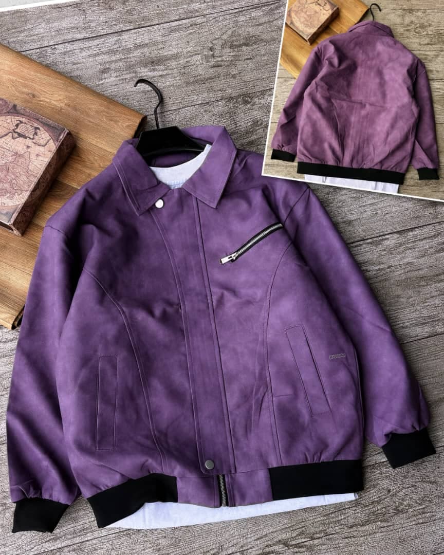 Purple suede bomber jacket with black rib trim on hanger and back view inset.